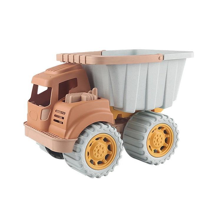 Toy dump truck with a tan cab, gray cargo bed, and chunky wheels
