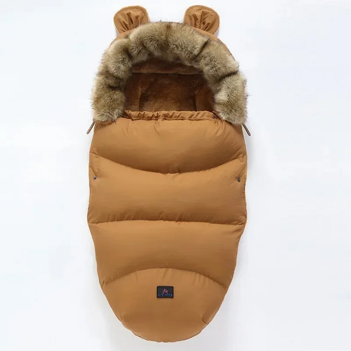 Tan quilted stroller footmuff with faux fur trim and small matching ears