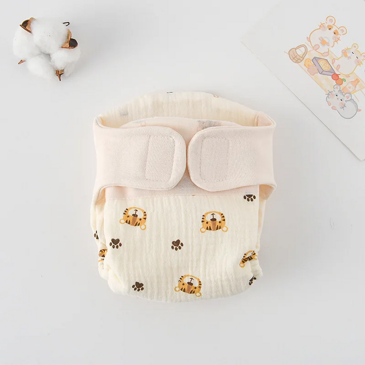 Cloth diaper with small tiger faces and paw-print details
