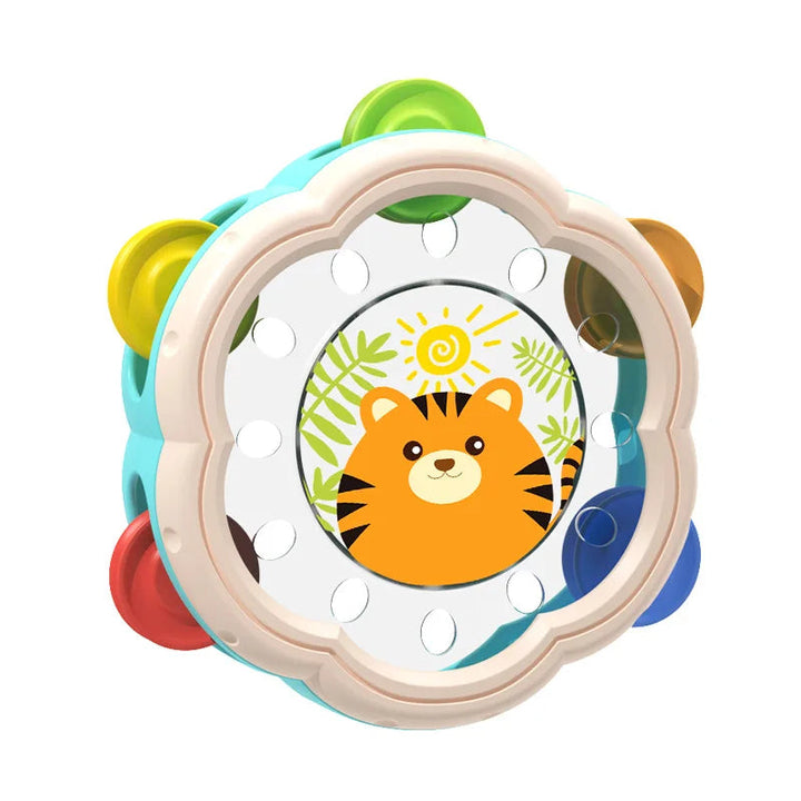 Tiger tambourine with a turquoise frame, cream scalloped rim, and colorful jingles