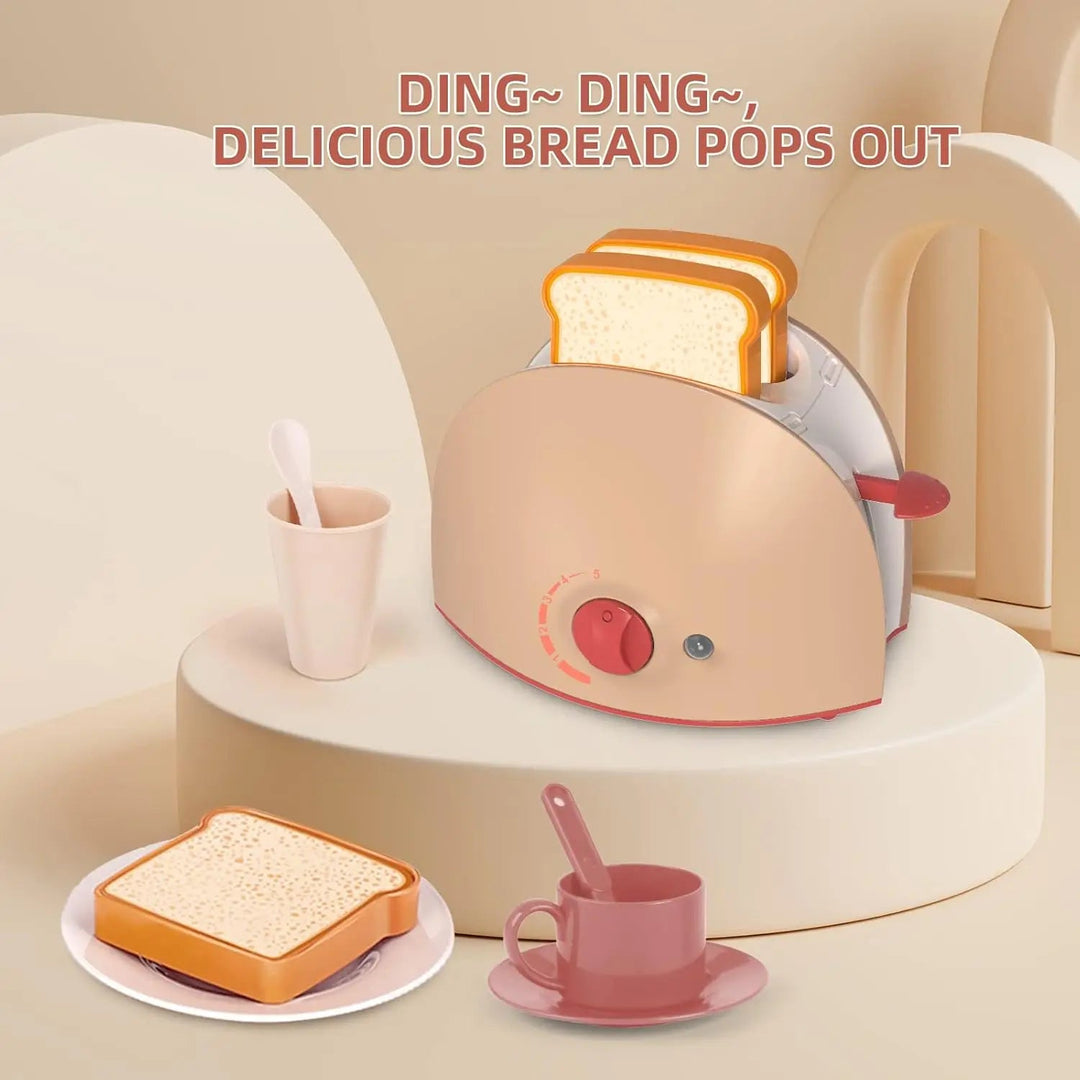 Beige toy toaster with play bread, a side lever, a front dial, and a cup and saucer.