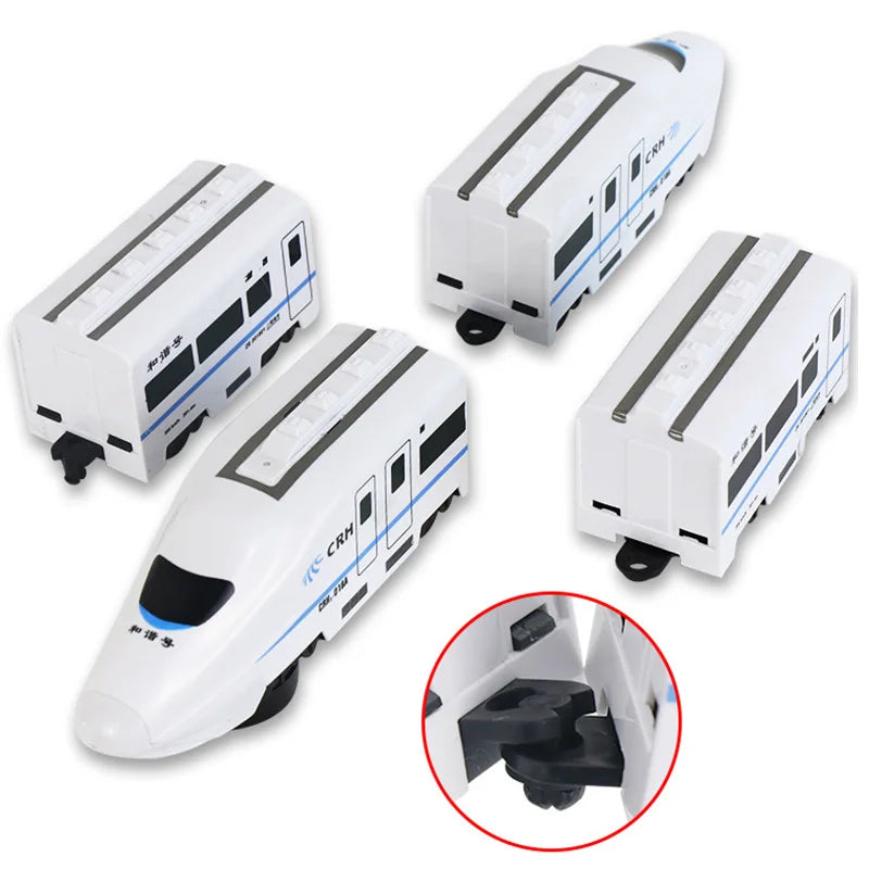 Separated toy train sections with a close-up of the connecting coupler