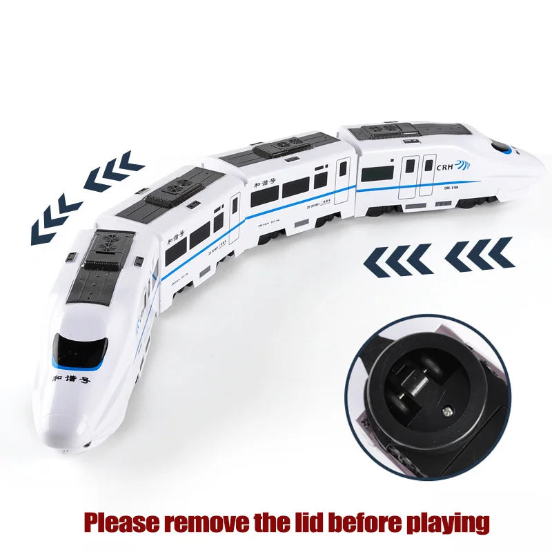 White toy train with turning arrows and a close-up of its underside