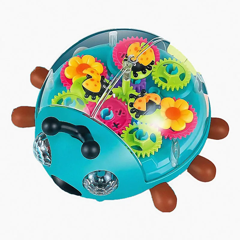 Top view of the turquoise beetle toy with black antennae, brown legs, and colorful gears