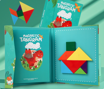 Open turquoise dinosaur-themed tangram booklet with colorful magnetic shapes
