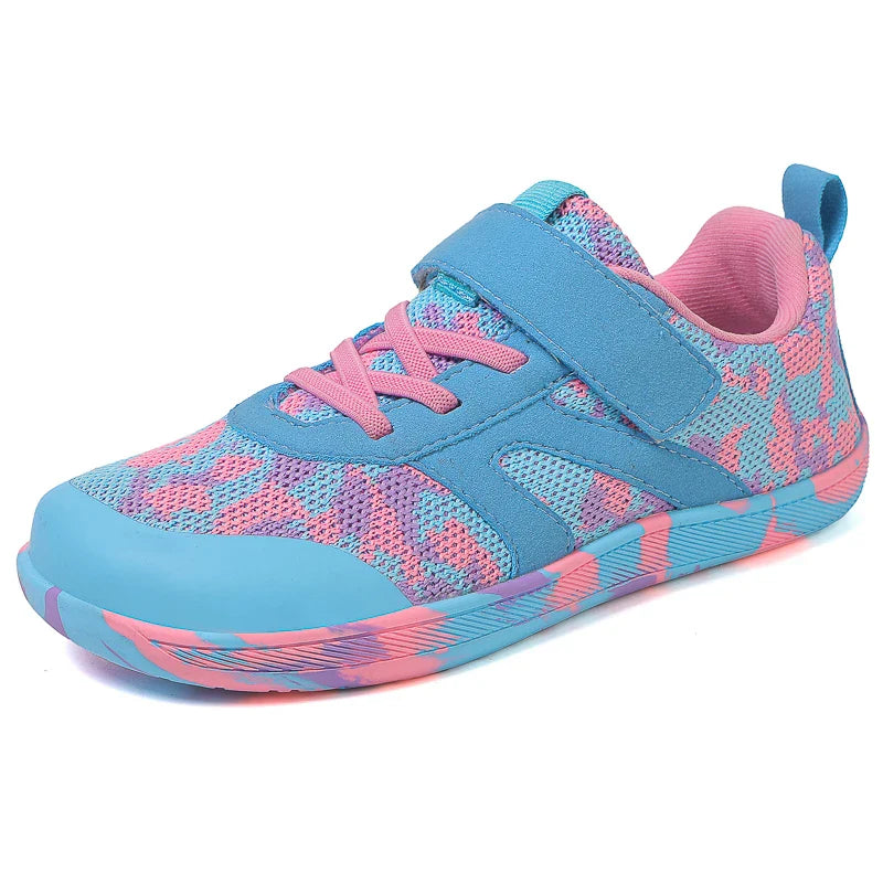 Side view of a turquoise and pink barefoot sneaker with a turquoise strap and heel loop