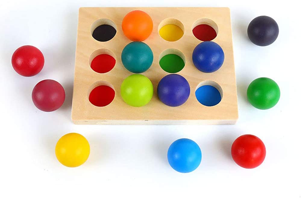 Twelve-space wooden sorting board with colorful balls on and around it