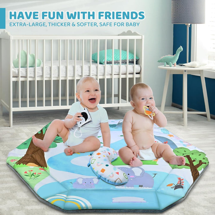 Two babies sitting on an animal-print play mat with a curved cushion
