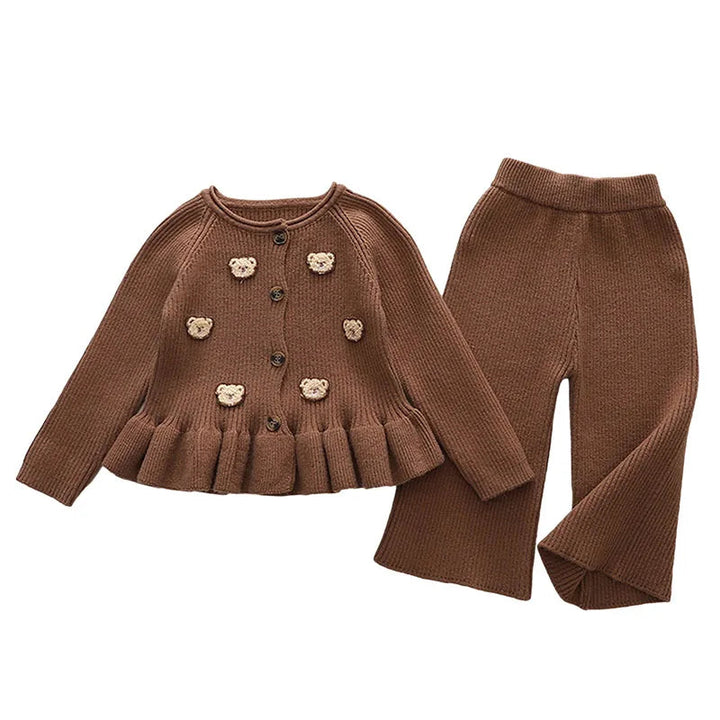 Brown two-piece outfit with a bear-detail sweater and matching pants against a white background