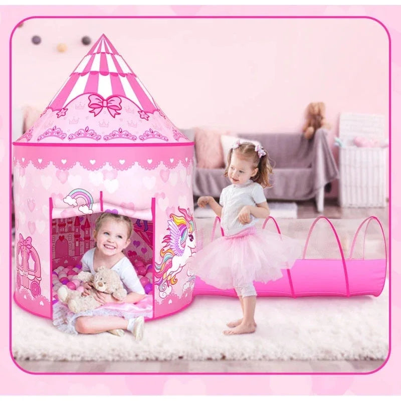 Children playing beside a pink unicorn-print tent with an attached crawl tunnel.