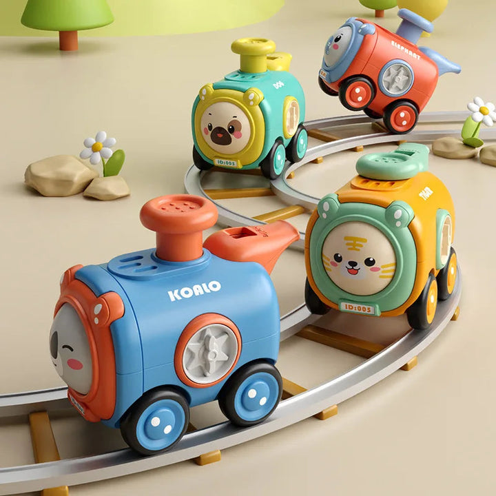 Four colorful animal-face toy trains arranged on a curved display track.