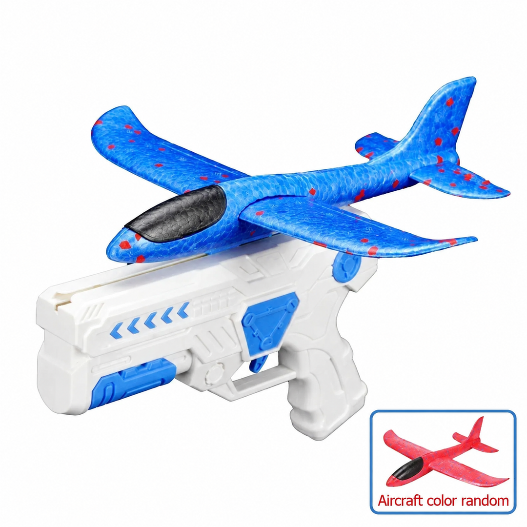 White and blue launcher holding a blue foam airplane, with a red airplane shown in an inset