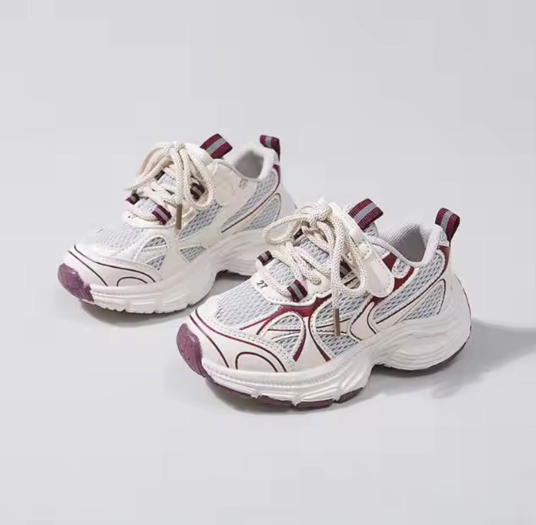White kids' sneakers with bordeaux accents, mesh panels and thick sculpted soles