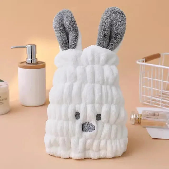 White microfiber hair-drying cap with gray bunny ears and a stitched face