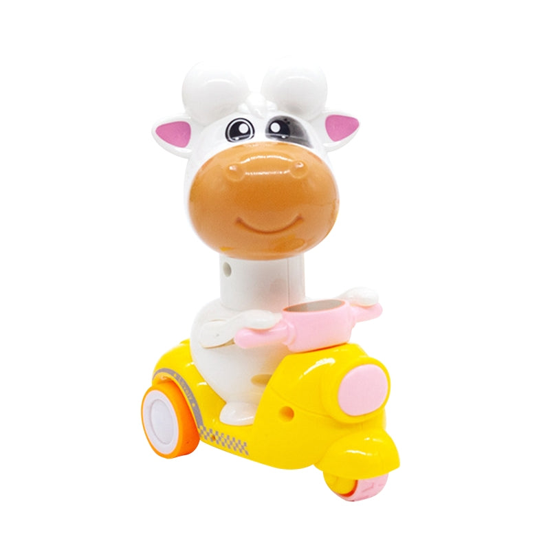 White cow rider with pink handlebars on a yellow toy motorcycle
