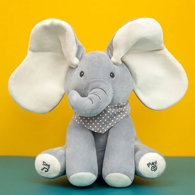 Gray elephant plush with white ears and feet and a gray polka-dot bandana
