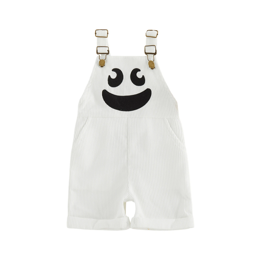 White ribbed ghost overalls with a smiling black face and adjustable shoulder straps.