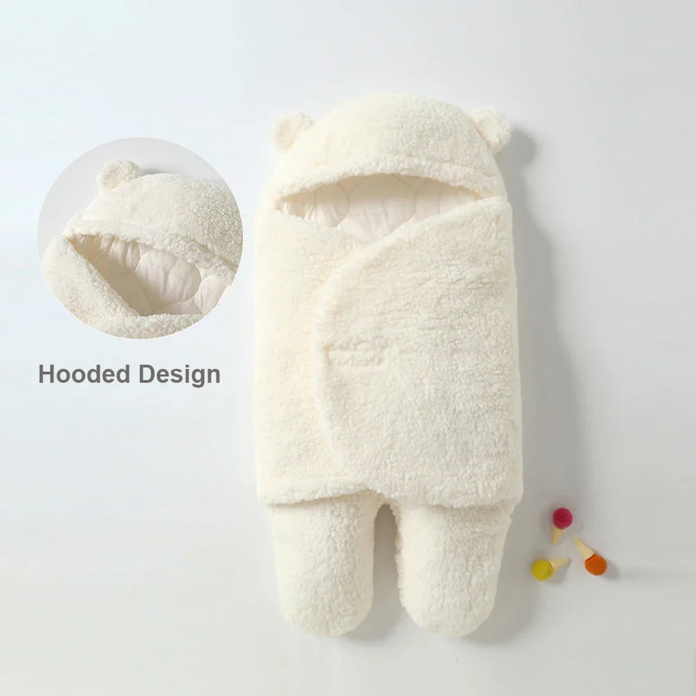 White sherpa baby wrap blanket with a close-up of the bear-ear hood.