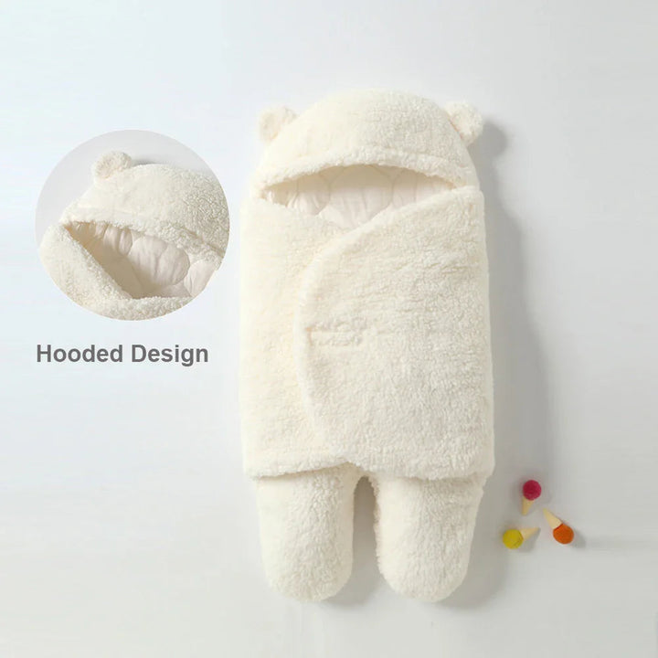 White sherpa baby wrap blanket with a close-up of the bear-ear hood.