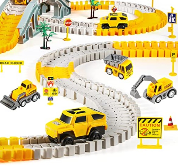 Yellow and gray race track with toy cars, construction vehicles, road signs and palm trees