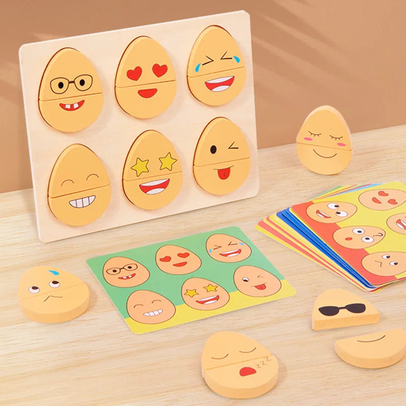 Wooden puzzle board with six facial expressions, matching cards, and loose eye and mouth pieces