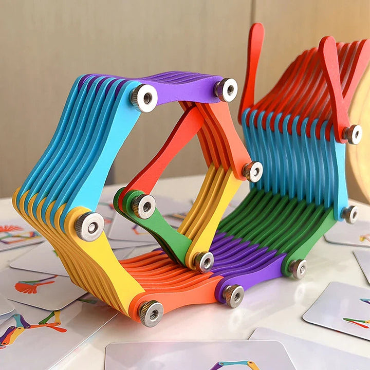 Colorful wooden folding puzzle opened into connected geometric shapes beside pattern cards