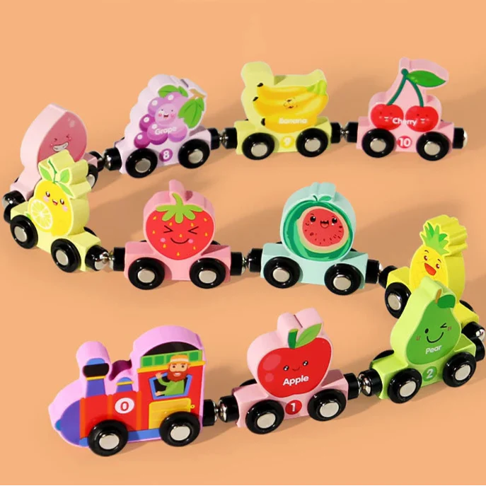 Wooden magnetic fruit train with apple, pear, strawberry, and banana cars