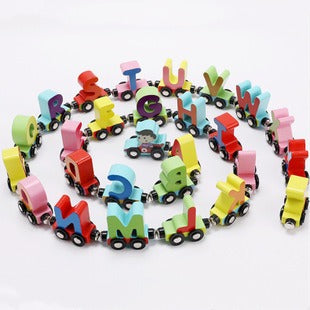 Wooden letter train cars connected in a spiral arrangement.