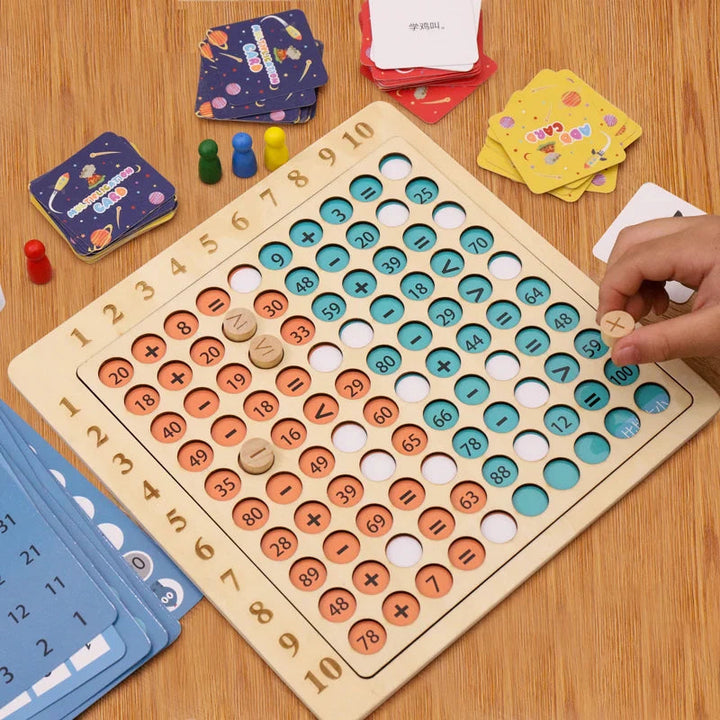 Hand moving a wooden piece on a math board with colored numbers and operation symbols