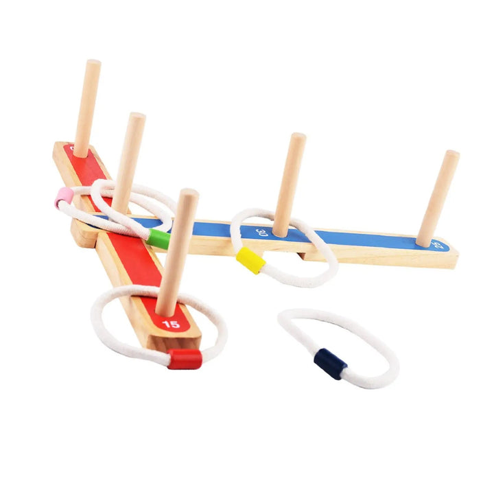 Wooden ring toss game with red and blue crossed base pieces, five pegs, and five rings.