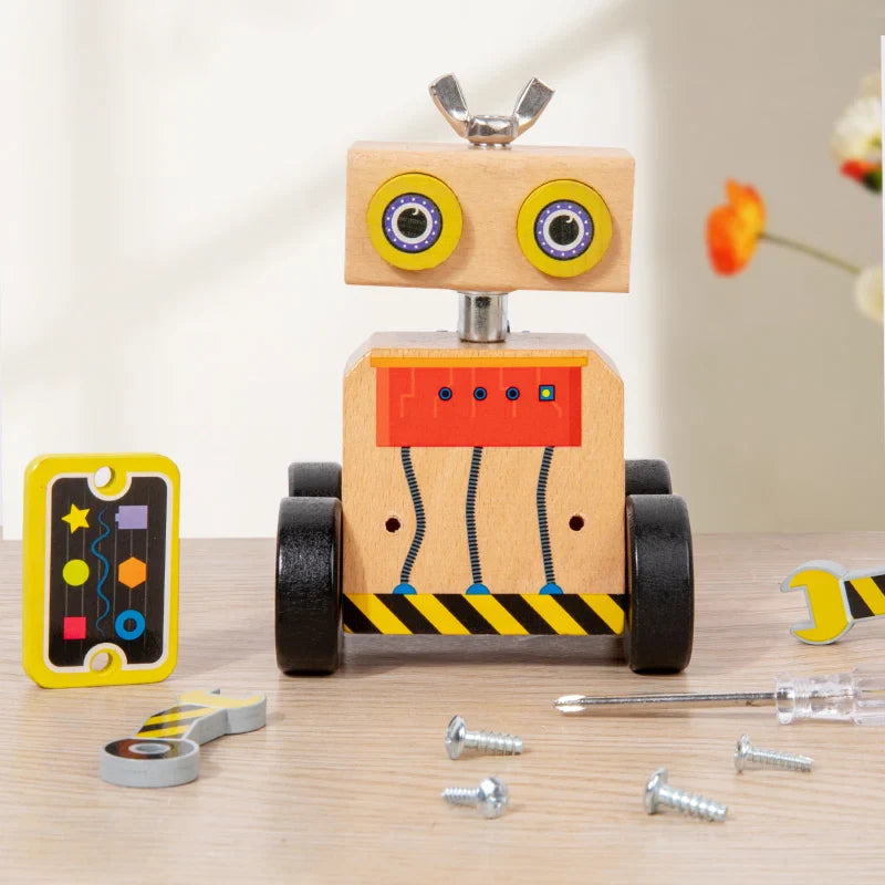 Front of a wooden robot with its decorative panel, screws, and tools laid beside it