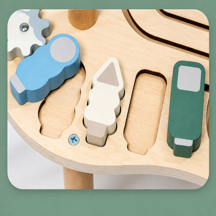 Shaped wooden pieces beside matching cutouts on the activity table