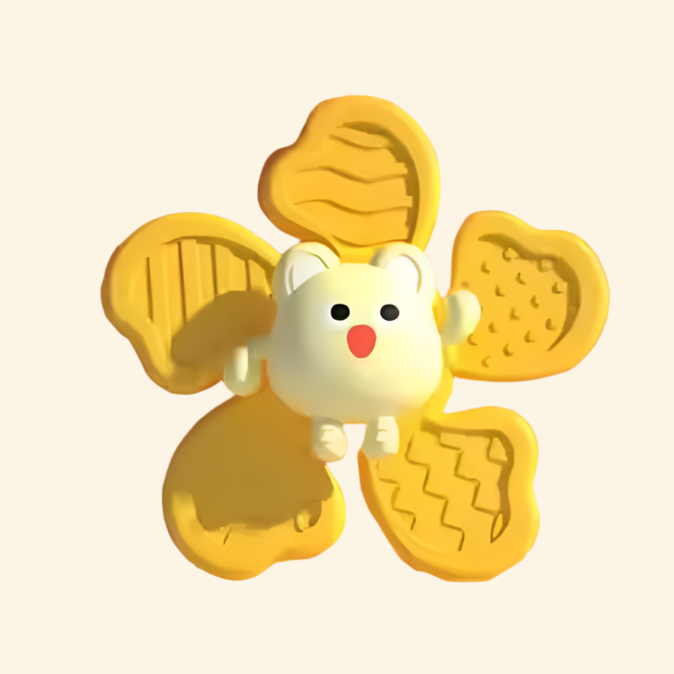 Yellow animal spinner with molded patterns on its arms