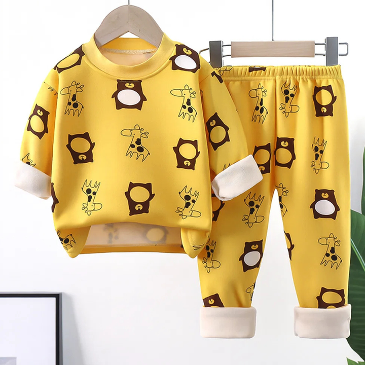 Yellow pajama set with cartoon bears, giraffes, and cream cuffs