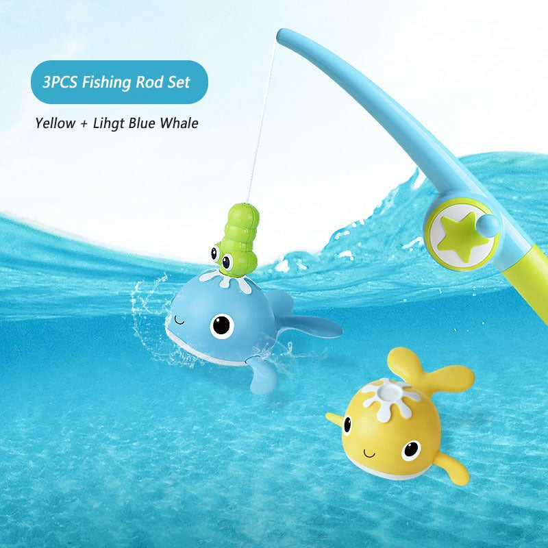 Magnetic fishing rod catching a light blue whale beside a yellow whale in the three-piece light set.