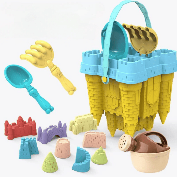 Yellow castle bucket with a blue rim, colorful sand molds, a scoop, rake and watering can