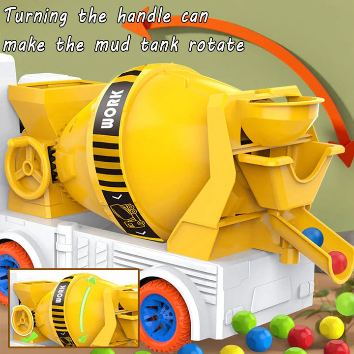 Close-up of a yellow toy cement mixer&