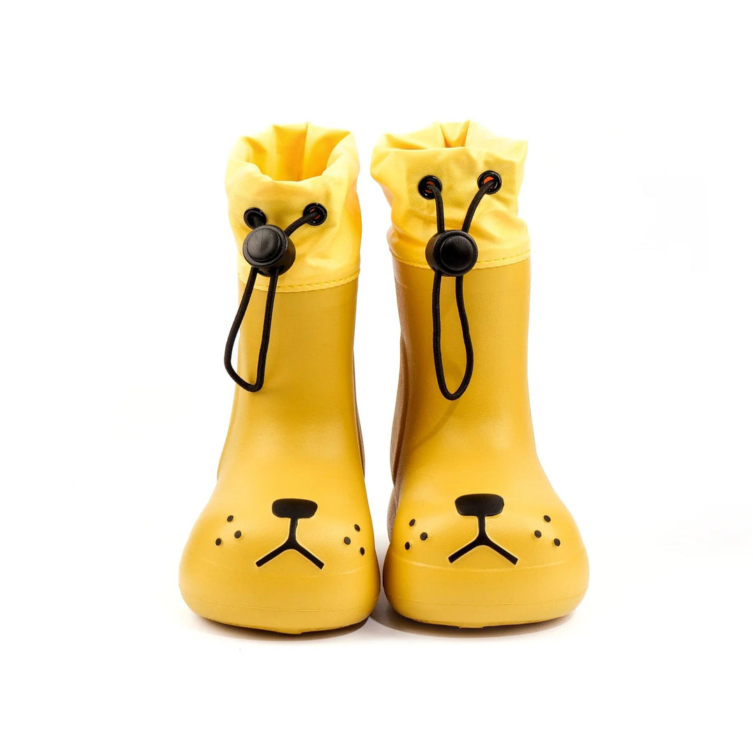 Yellow dog-face rain boots with gathered cuffs, black drawcords, and raised nose details