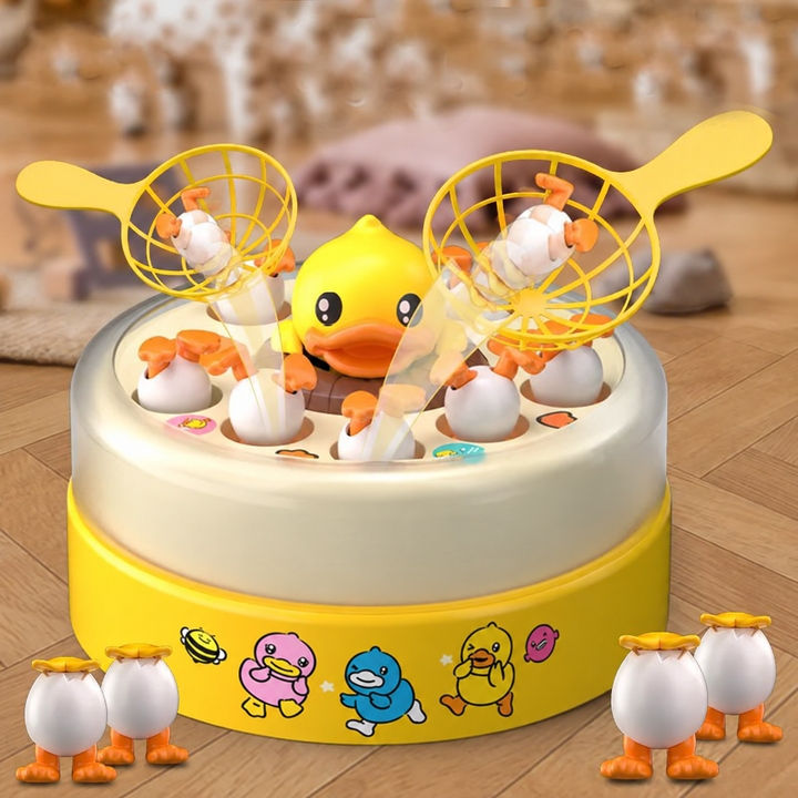 Yellow duck-catching board game with two nets and egg-shaped pieces around the base