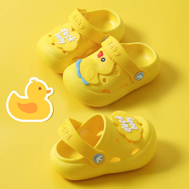 Yellow kids' slippers with duck decorations, ventilation holes, and heel straps in two positions