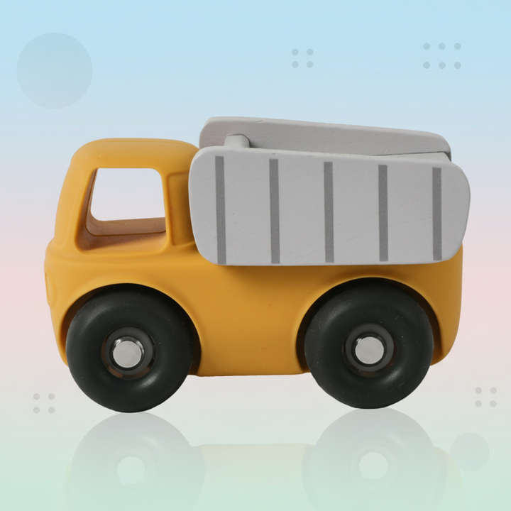 Yellow dump truck toy with a gray bed and black wheels
