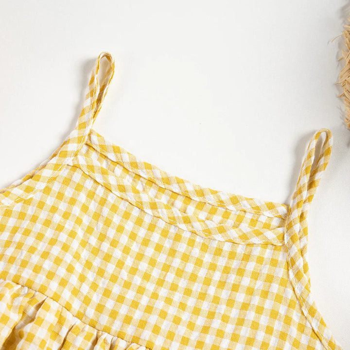 Close-up of the yellow gingham romper&