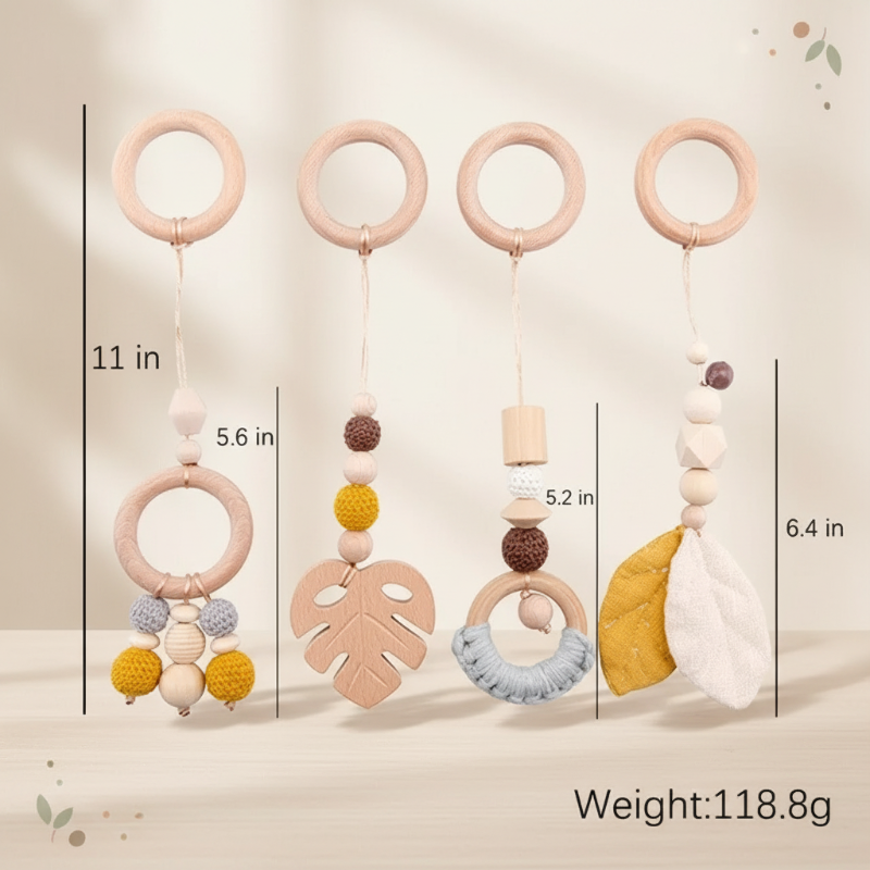 Four Yellow Leaf hanging toys with wooden rings, beads, leaf shapes, and length measurements.