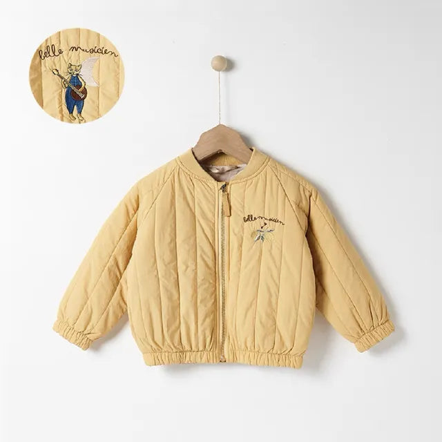 Yellow quilted winter coat on a hanger with a zip front and an inset of its back embroidery