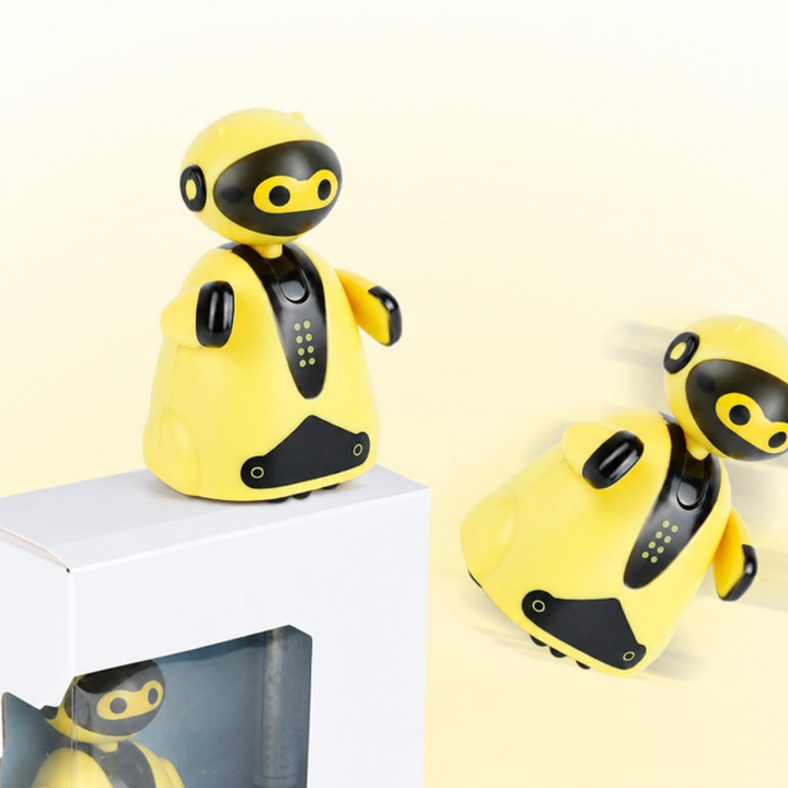 Yellow robot toys displayed on and beside a window-front box.