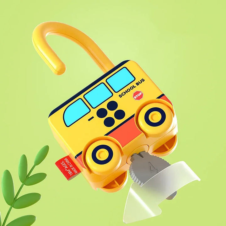 Yellow school bus toy lock with its loop open and a gray key inserted at the bottom.