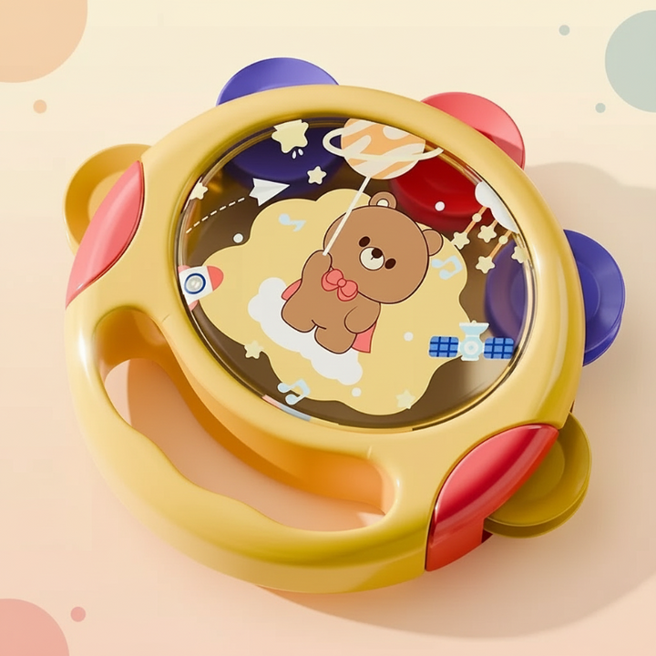 Yellow toy tambourine with red and purple accents and a built-in grip opening