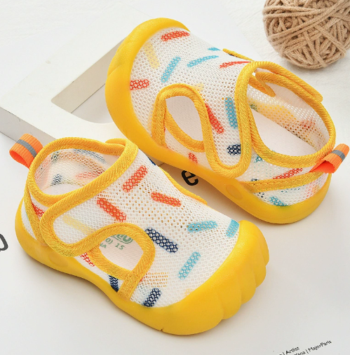 Yellow-trimmed mesh sandals with multicolor prints and yellow toe caps